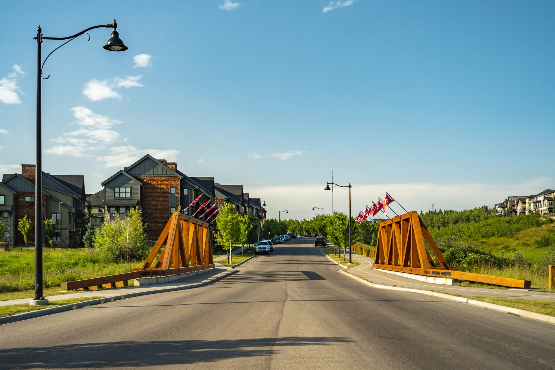 Photograph of Aspen Woods timber bridge and surrounding homes