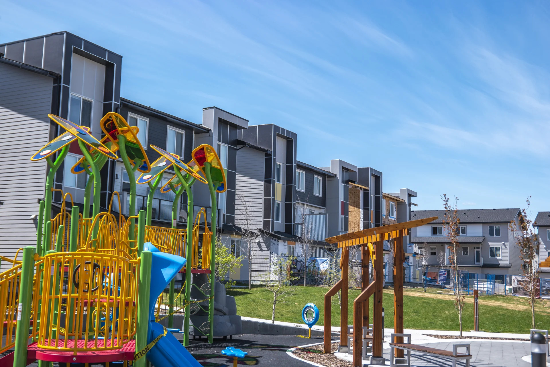 Photograph of Redstone sunflower playground and modern townhome courtyard
